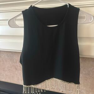 Black cropped tank with sparkle fringes at the bottom of the shirt